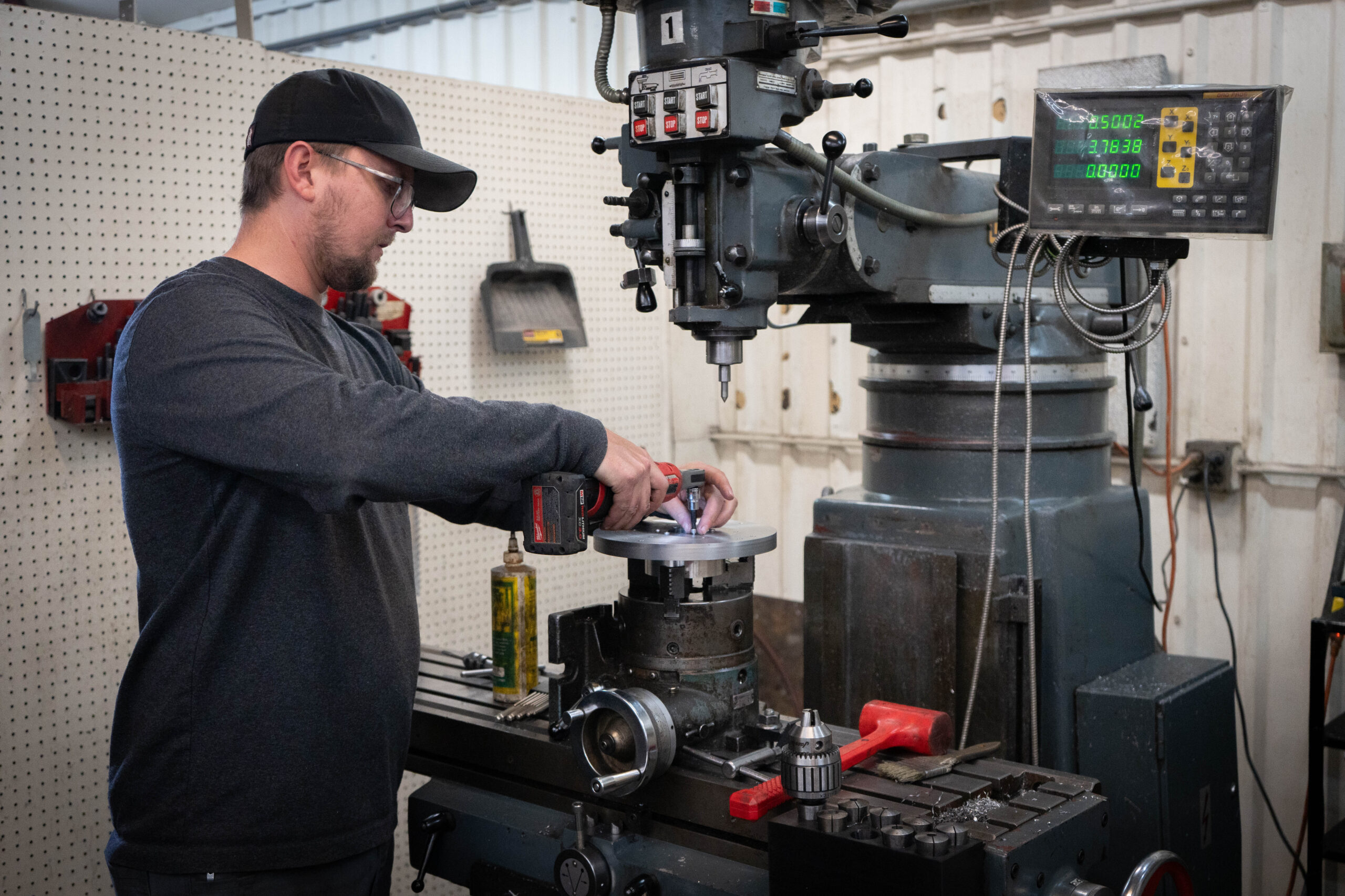 person working with the milling machine