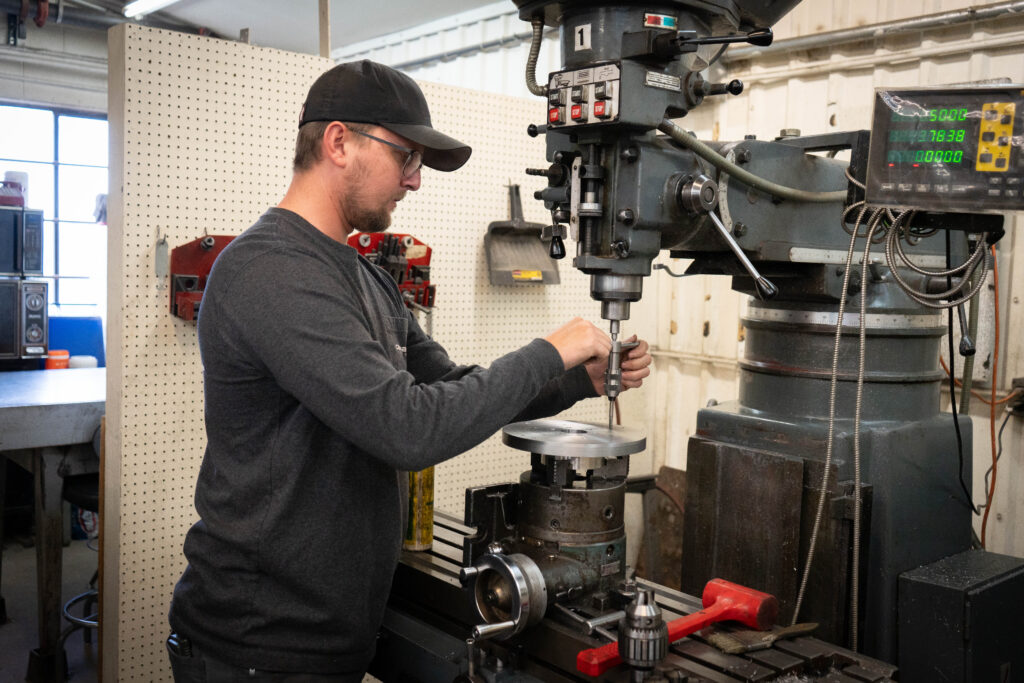 person using milling machine
